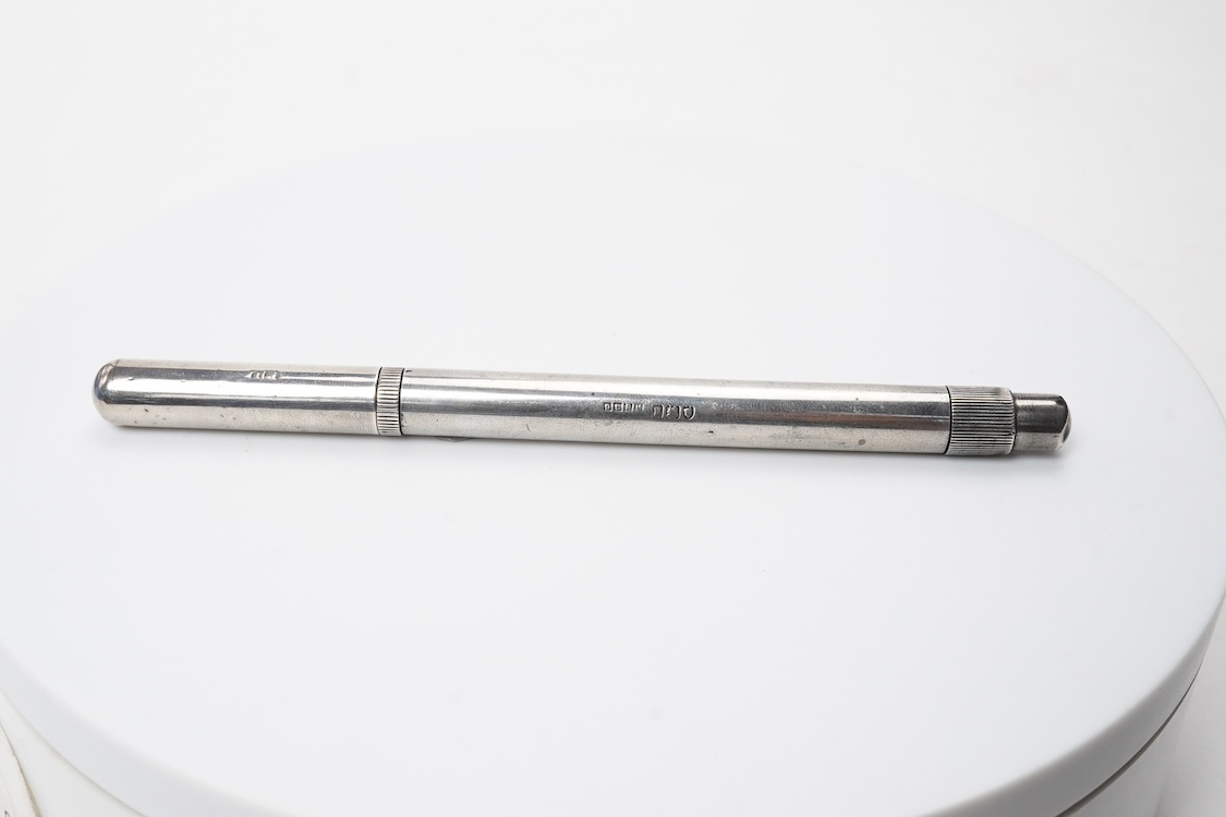 A De la Rue Onoto Sterling silver piston filler with fine flexible nib and over-and-under feed